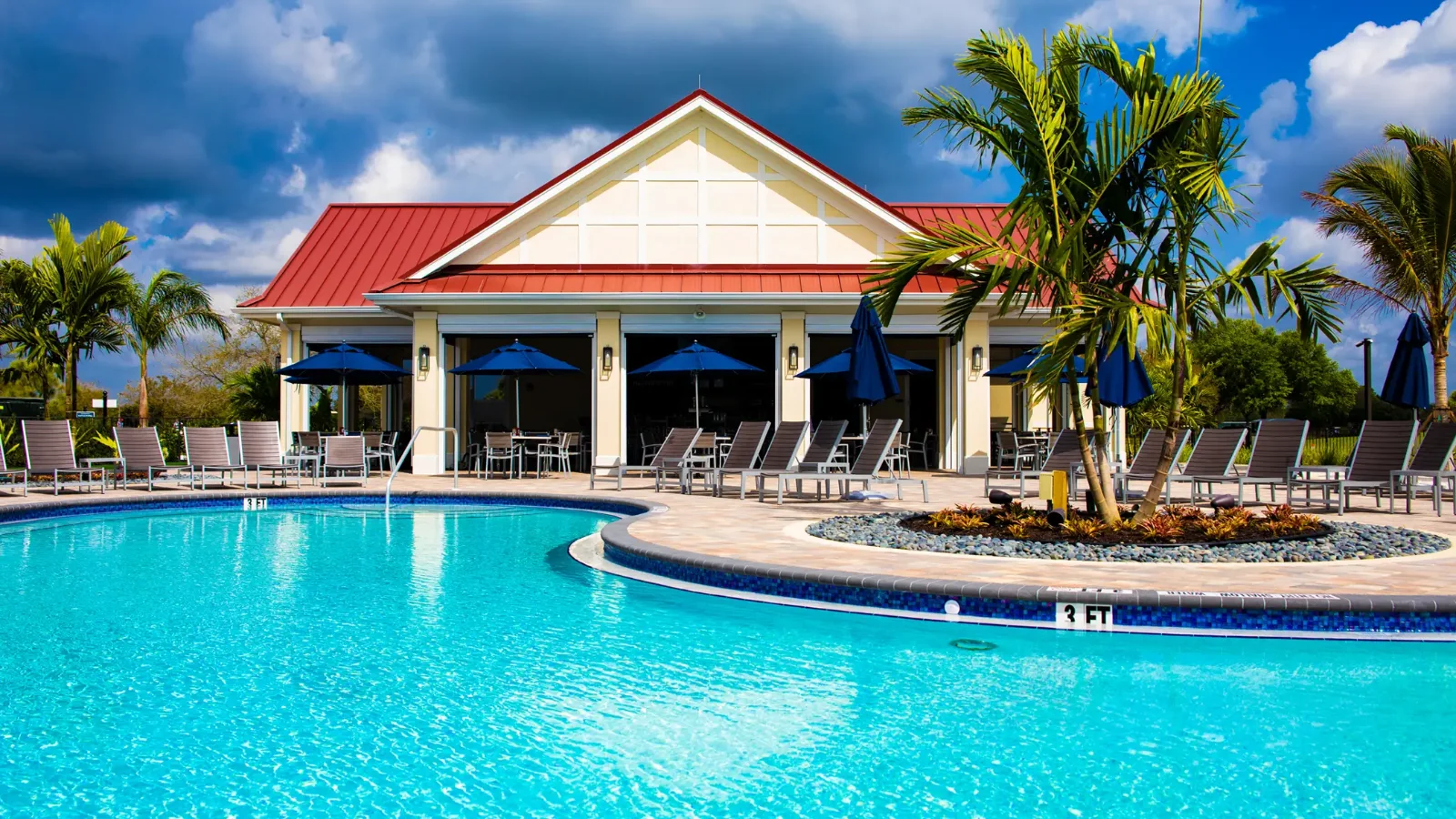 The resort-style pool and sun deck at River Hall in Alva, Florida